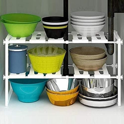 Under-sink rack around pipes