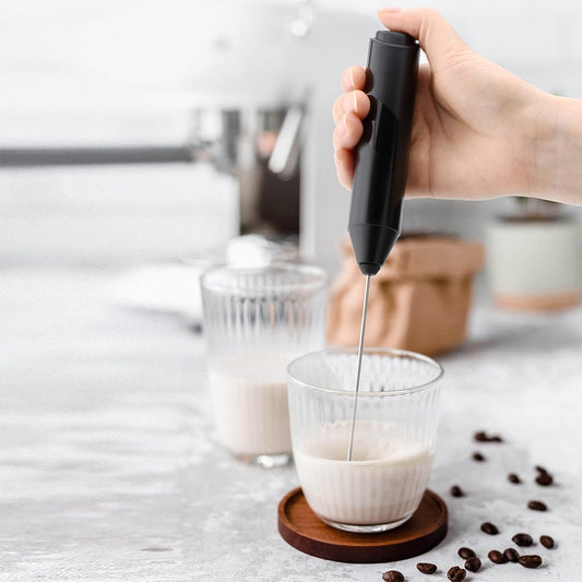 Handheld electric milk frother