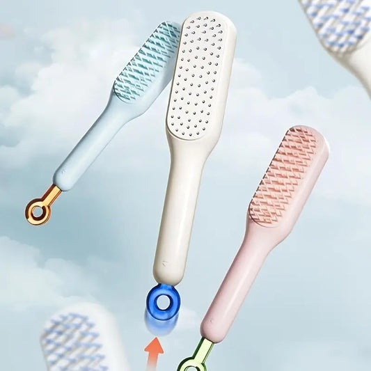 Self-cleaning detangling hair brush