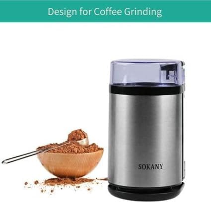 Grinding coffee beans in electric grinder